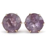 Pair of unmarked gold amethyst solitaire stud earrings, 7mm in diameter, 1.5g : For further