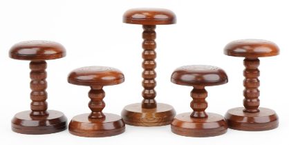 Five Victorian style turned mahogany hatstands including two pairs, the largest 30cm high : For