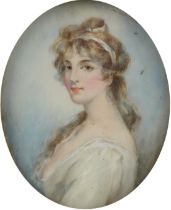 19th century oval hand painted portrait miniature of a young female housed in an ebonised frame, The