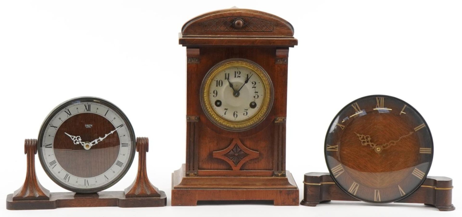Three mantle clocks comprising Junhans and two Smiths, the largest 31.5cm high : For further