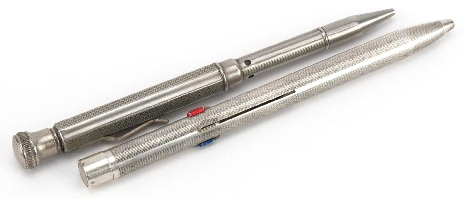 Unmarked silver multi pen with engine turned decoration and a white metal example : For further - Image 2 of 3