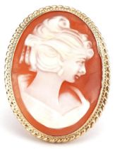 9ct gold cameo shell ring carved with a maiden, 2.8cm high, size P, 6.7g