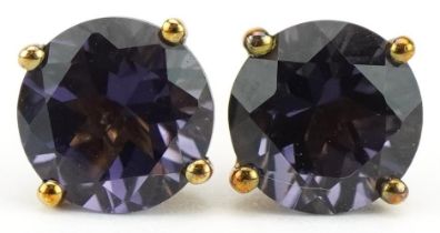 Pair of 9ct gold amethyst solitaire stud earrings, 7.0mm in diameter, 1.2g