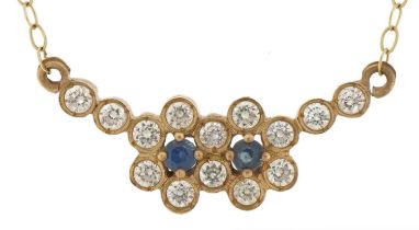 9ct gold blue topaz and clear stone double flower head necklace, 38cm in length, 1.2g