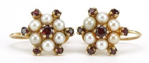 Pair of 9ct gold garnet and pearl flowerhead earrings with screw backs, 1.3cm wide, 4.4g
