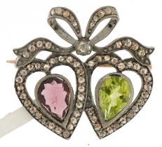 Unmarked white and yellow gold double love heart bow brooch set with diamonds, red garnet and