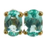 Pair of 9ct gold blue stone solitaire stud earrings, 6mm high, 0.8g