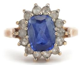 9ct gold sapphire and clear stone ring, the sapphire approximately 8.0mm x 6.0mm x 3.7mm deep,