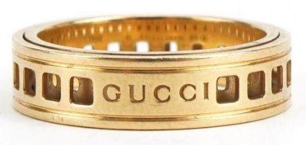 Gucci, 18ct gold spinning ring numbered 1TO, size O, 6.3g