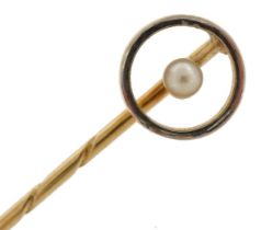 Art Deco 9ct gold and seed pearl stickpin housed in a Wilkens Jewellers Hamburg fitted case, 6cm