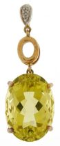 Large unmarked gold citrine and diamond pendant, tests as 9ct gold, the citrine approximately 18.