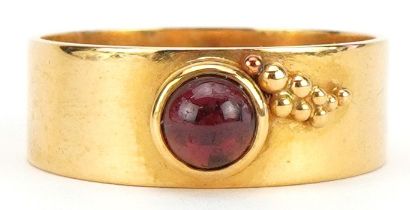 Stylish 22ct gold ring set with a cabochon garnet, RDS maker's mark, size M, 4.8g