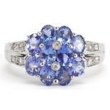 14ct white gold iolite and diamond flower head ring, size N, 3.1g