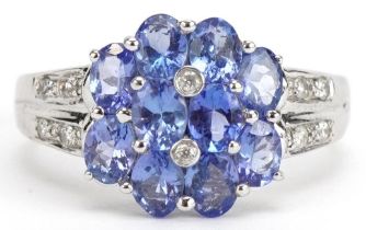 14ct white gold iolite and diamond flower head ring, size N, 3.1g