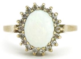 9ct gold cabochon opal and cubic zirconia ring, size O/P, 2.4g