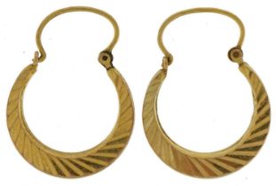 Pair of 9ct gold engine turned hoop earrings, 2.4cm high, 2.6g