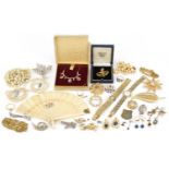 Vintage and later costume jewellery including brooches, simulated pearl necklaces, silver