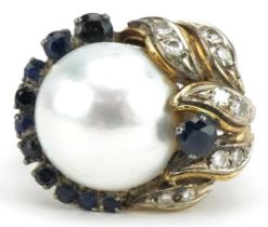 Unmarked gold pearl, diamond, sapphire cocktail ring, tests as 14ct gold, size P, 11.2g