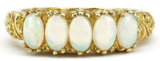 9ct gold cabochon opal five stone ring with ornate scrolled shoulders, size M/N, 3.4g
