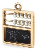 9ct gold and pearl abacus charm with I love you inscription, 1.4cm wide, 1.8g