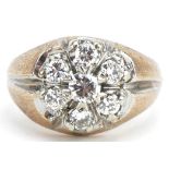 14ct gold diamond flower head ring, total diamond weight approximately 1.10 carat, size Q/R, 11.5g