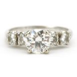 White gold diamond five stone ring, indistinct marks, possibly 14k, the central diamond