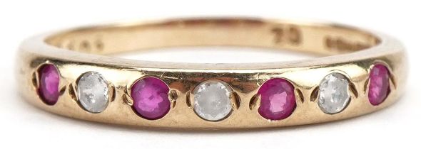 9ct gold ruby and cubic zirconia half eternity ring, size O/P, 1.8g