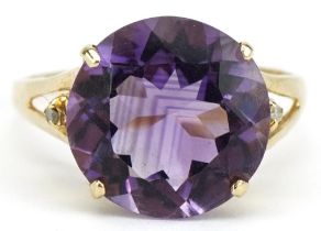 14ct gold amethyst solitaire ring with diamond set shoulders, the amethyst approximately 12.0mm in