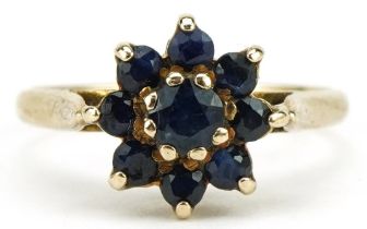9ct gold blue spinel flower head ring, size K, 2.1g