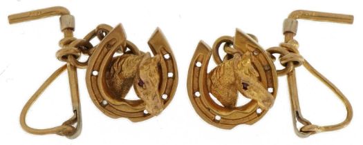 Pair of 9ct gold equestrian interest horse head and riding crop cufflinks with ruby eyes, 3cm in