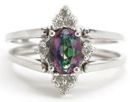 14ct white gold marquis diamond cluster and rainbow quartz swivel ring housed in a Jewel Palace