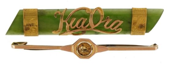 9ct gold mounted green jade bar brooch and a 9ct gold citrine bar brooch, the largest 5cm wide,