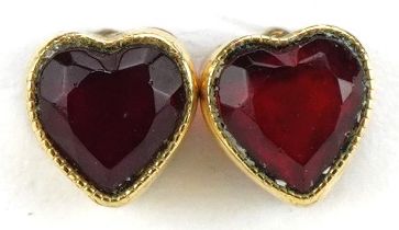 Pair of yellow metal red stone love heart stud earrings, 6mm high, 0.9g