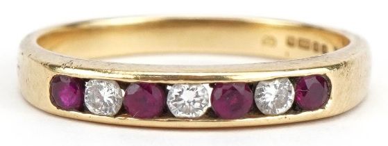 18ct gold diamond and ruby seven stone half eternity ring, the diamonds approximately 2.20mm in