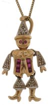 9ct gold ruby and diamond clown pendant with articulated limbs on a 9ct gold necklace, 2.5cm high