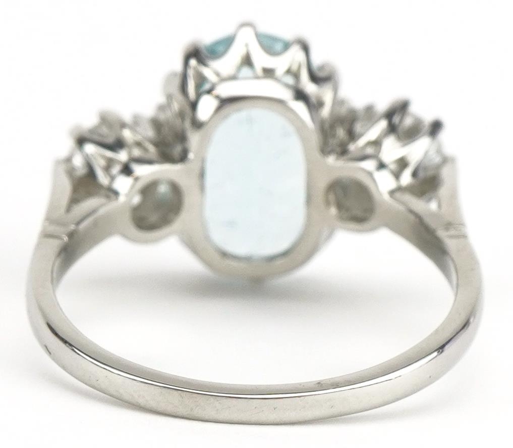 Unmarked white gold aquamarine and diamond three stone ring, tests as 18ct gold, total diamond - Image 2 of 4