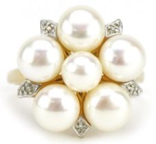 9ct gold cultured pearl and diamond flower head ring, size T, 5.8g