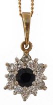 9ct gold sapphire and clear stone flower head pendant on a 9ct gold necklace, 1.8cm high and 40cm in