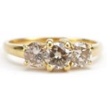 Unmarked gold diamond three stone ring, tests as 18ct gold, total diamond weight approximately 1.