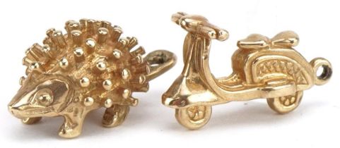 Two 9ct gold charms comprising hedgehog and scooter, the largest 1.7cm in length, total 3.7g