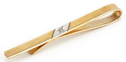 9ct two tone gold tie clip set with a diamond, 4.7cm wide, 3.1g