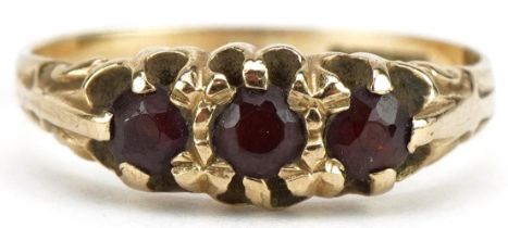 9ct gold garnet three stone ring, size L, 1.6g