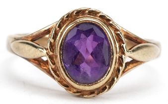 9ct gold amethyst solitaire ring with pierced shoulders, size P, 2.2g