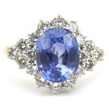 18ct gold Sri Lankan sapphire and diamond four tier cluster ring, weight of the sapphire 6.54g,