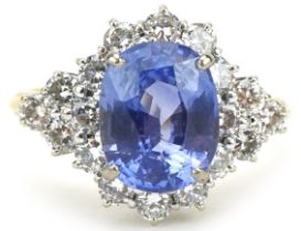 18ct gold Sri Lankan sapphire and diamond four tier cluster ring, weight of the sapphire 6.54g,