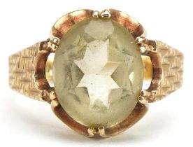 9ct gold smoky quartz solitaire ring with pierced setting and engine turned shoulders, size I/J, 2.