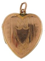 9ct gold back and front engine turned love heart locket, 2.4cm high, 3.6g