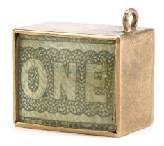 9ct gold emergency one pound note charm, 1.4cm wide, 3.3g