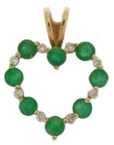 9ct gold diamond and emerald love heart pendant, 2.5cm high, 1.2g