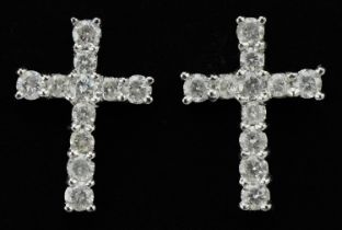 Pair of 9ct white gold diamond cross stud earrings with screw backs, total diamond weight